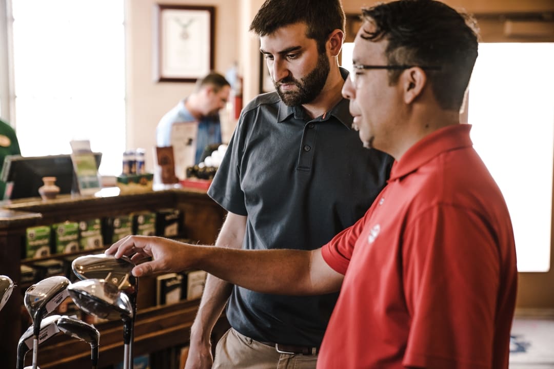 Shopping for golf equipment in a retail shop