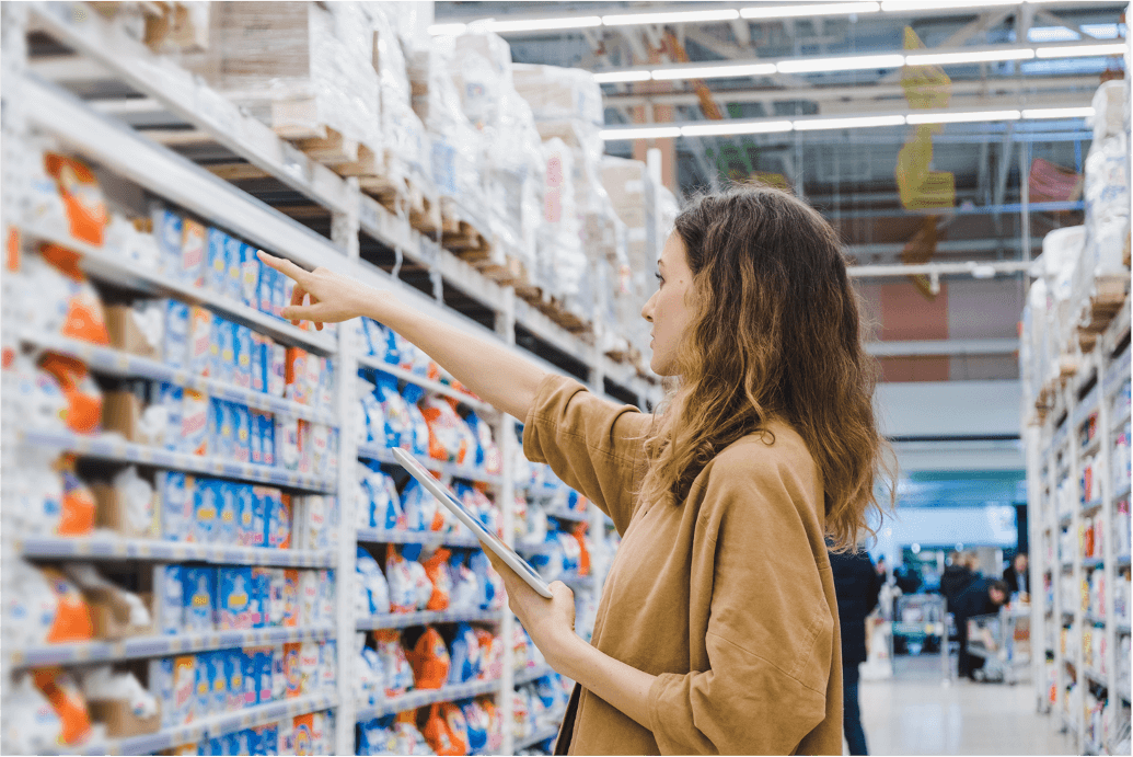 Shopper looking at items on shelf