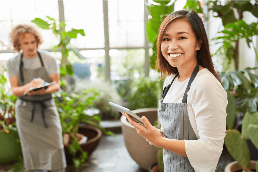 Employees working in a greenhouse