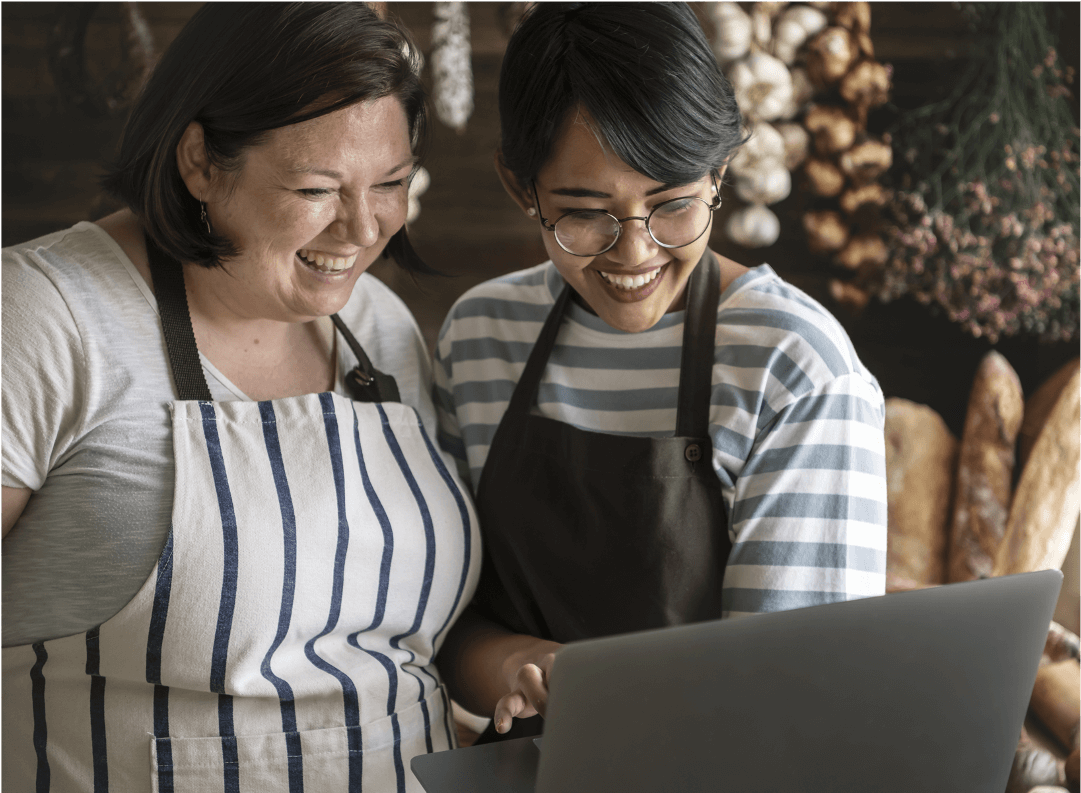 Employees reviewing data on tablet