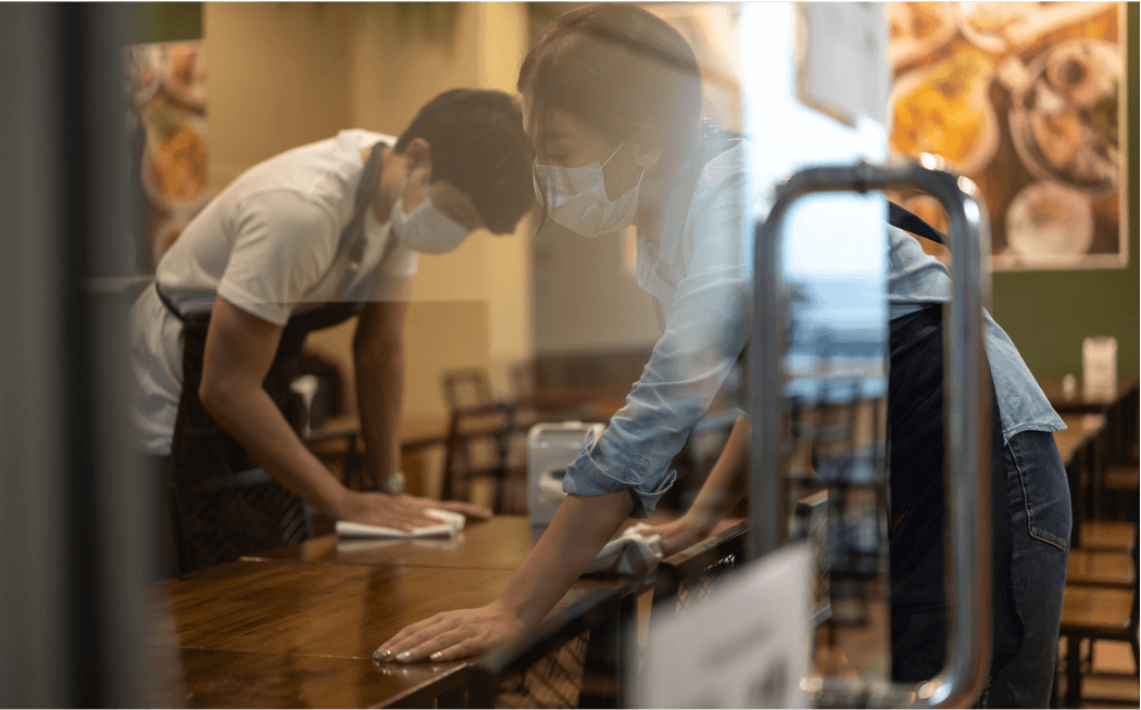 Woman working in face mask and safety gear